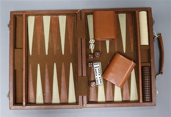 A vintage Gucci leather-covered backgammon set